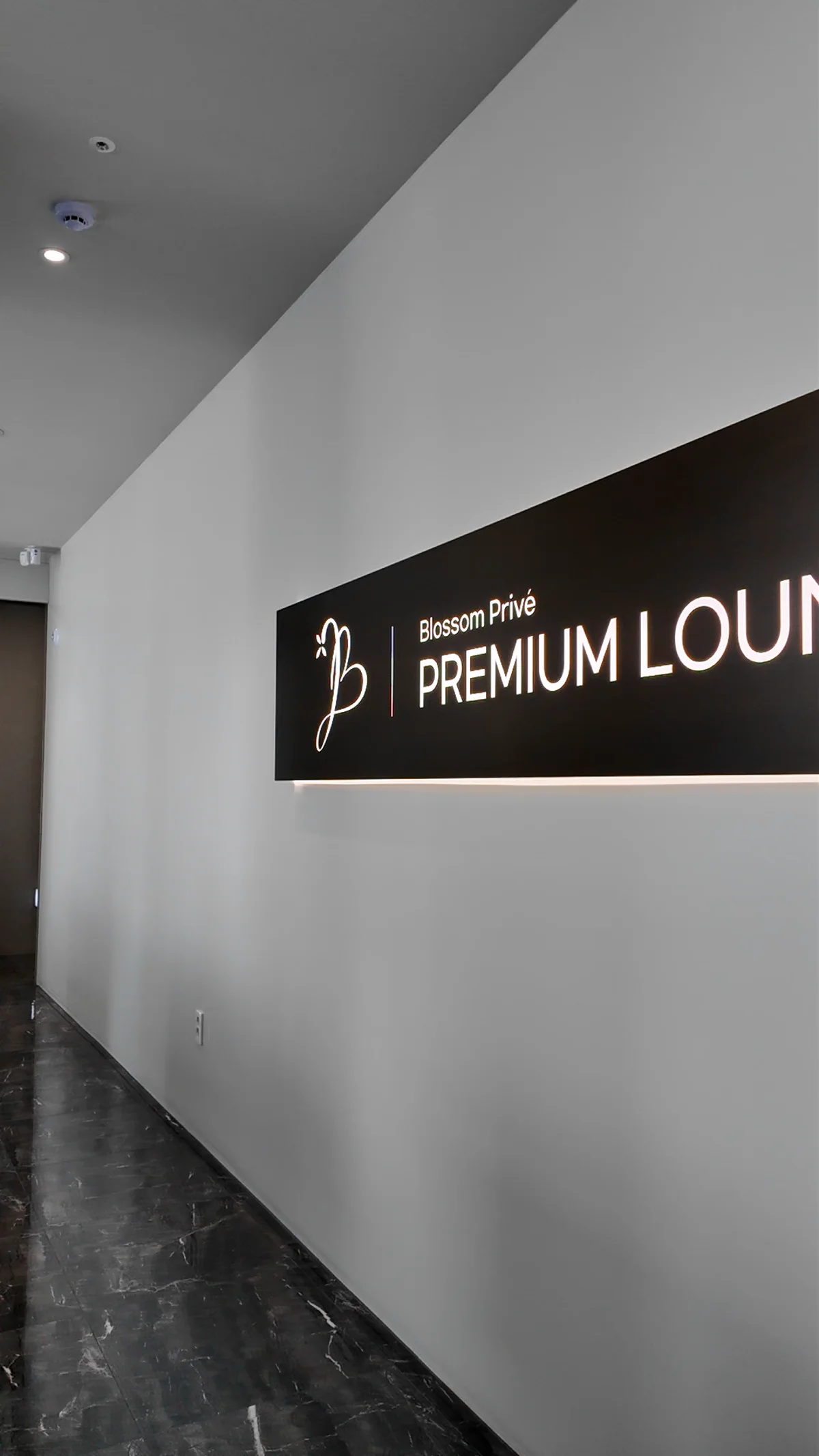 Clinic corridor with a wall sign