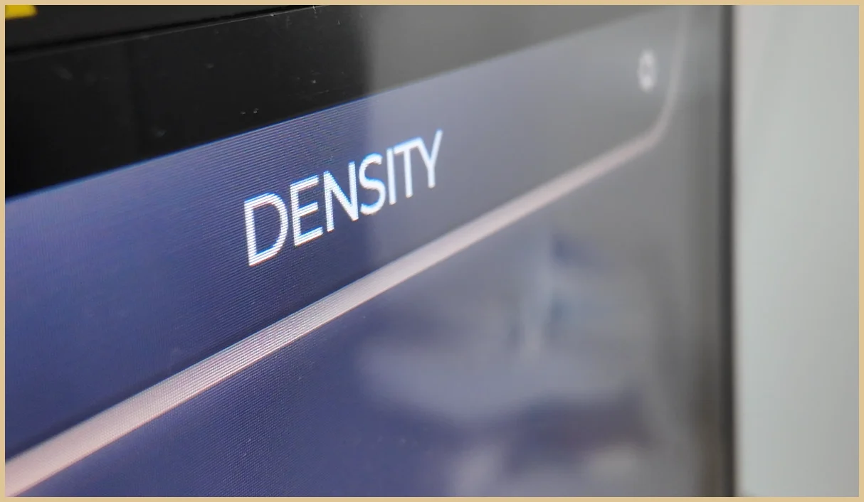 Close-up of the console touchscreen header, which reads DENSITY (the clinic writes Densiti)